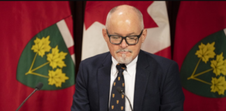 安省卫生官要求接种疫苗,预计COVID-19和流感将在Holiday达到高峰